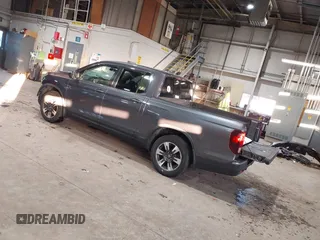 2019 Honda Ridgeline RTL with VIN 5FPYK2F54KB005791, listed as a IAAI auction lot 41285980 with 49,729 mi miles and . Bid and sale history available at DreamBid. Image 3.