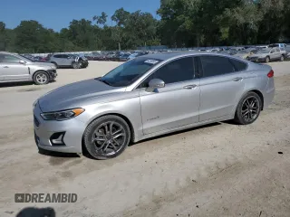 2019 Ford Fusion Titanium with VIN 3FA6P0RU1KR209297, listed as a Copart auction lot 54358065 with 122,600 mi miles and Salvage Title. Bid and sale history available at DreamBid. Image 1.