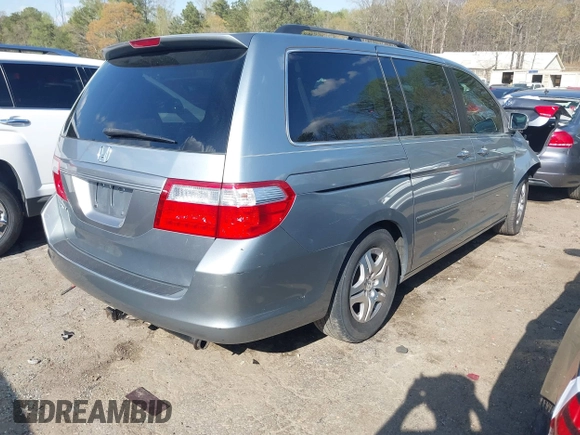 2007 Honda Odyssey EX-L with VIN 5FNRL38677B054173, listed as a IAAI auction lot 41888792 with 142,438 mi miles and . Bid and sale history available at DreamBid. Image 4.