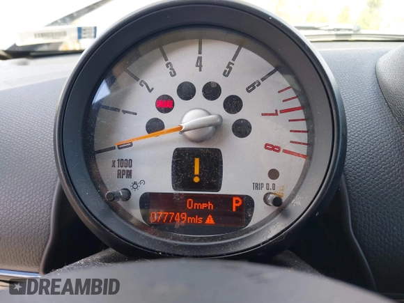 2014 MINI Countryman S with VIN WMWZC3C58EWP27041, listed as a IAAI auction lot 42082489 with 77,749 mi miles and . Bid and sale history available at DreamBid. Image 7.