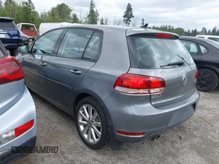2012 Volkswagen Golf TDI z VIN WVWNM7AJ8CW139028, wystawiony jako IAAI lot #42421116 z przebiegiem 60 776 mil mil oraz . Historia ofert i sprzedaży dostępna na DreamBid. Obrazek 3.