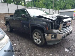2015 GMC Sierra 1500 SLE z VIN 1GTV2UEC3FZ152031, wystawiony jako IAAI lot #42416036 z przebiegiem 169 510 mil mil oraz . Historia ofert i sprzedaży dostępna na DreamBid. Obrazek 1.