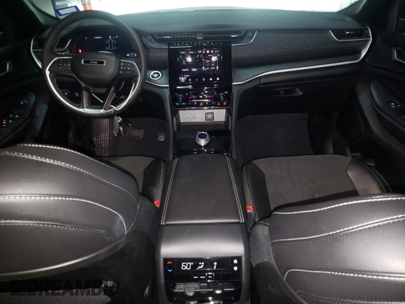 2023 Jeep Grand Cherokee Laredo with VIN 1C4RJJAG6P8867033, listed as a Copart auction lot 77134103 with 7,806 mi miles and Clean title. Bid and sale history available at DreamBid. Image 8.