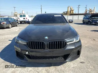 2021 BMW 5 Series 530e with VIN WBA13AG04MCF47235, listed as a Copart auction lot 69120474 with 74,779 mi miles and Salvage Title. Bid and sale history available at carsss.com. Image 5.