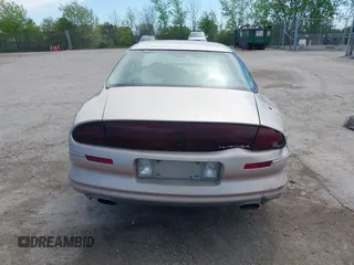 1999 Oldsmobile Aurora z VIN 1G3GR62C5X4114285, wystawiony jako IAAI lot #42271517 z przebiegiem 308 731 mil mil oraz . Historia ofert i sprzedaży dostępna na DreamBid. Obrazek 16.