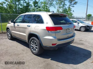 2014 Jeep Grand Cherokee Limited with VIN 1C4RJEBG4EC528934, listed as a IAAI auction lot 42033511 with 63,601 mi miles and . Bid and sale history available at DreamBid. Image 3.
