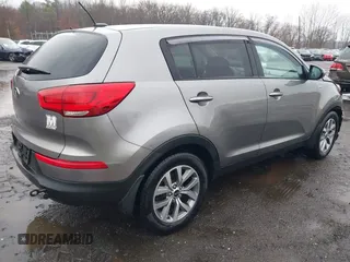 2014 Kia Sportage LX with VIN KNDPBCAC0E7601636, listed as a IAAI auction lot 41832978 with 145,353 mi miles and . Bid and sale history available at carsss.com. Image 4.