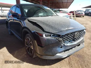 2023 Mazda CX-5 2.5 S Premium Plus Package with VIN JM3KFBEM3P0125736, listed as a IAAI auction lot 41578619 with 18,560 mi miles. Bid and sale history available at carsss.com. Image 1.