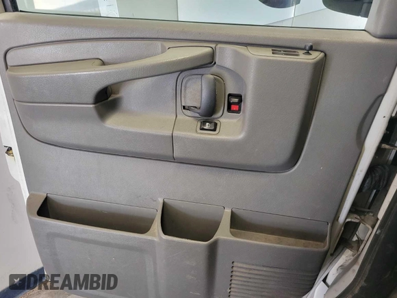 2013 Chevrolet Express Cargo with VIN 1GCWGFCA5D1141272, listed as a IAAI auction lot 42596142 with 262,421 mi miles and . Bid and sale history available at DreamBid. Image 4.