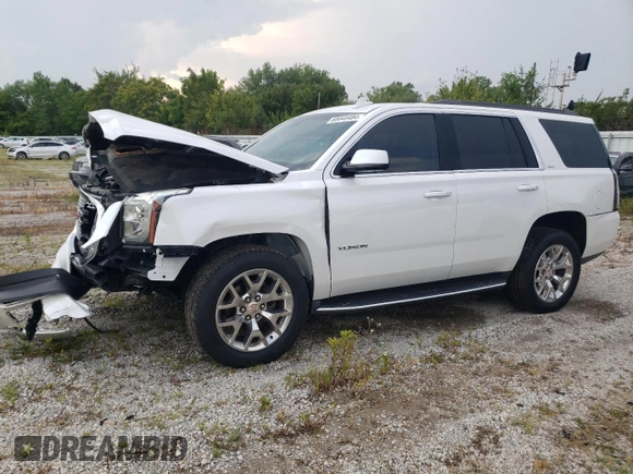 2016 GMC Yukon SLT with VIN 1GKS2BKC0GR265761, listed as a Copart auction lot 65645484 with 130,352 mi miles and Salvage Title. Bid and sale history available at carsss.com. Image 1.