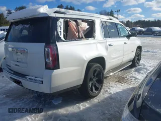 2020 GMC Yukon XL Denali with VIN 1GKS2HKJ3LR223239, listed as a IAAI auction lot 41606846 with 75,452 mi miles. Bid and sale history available at carsss.com. Image 4.
