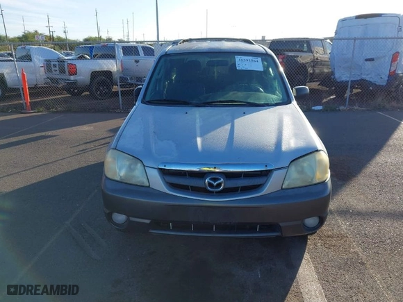 2004 Mazda Tribute LX with VIN 4F2YZ04174KM23373, listed as a IAAI auction lot 41392564 with 100,730 mi miles. Bid and sale history available at carsss.com. Image 6.