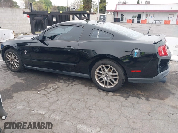 2012 Ford Mustang Premium with VIN 1ZVBP8AM3C5234884, listed as a IAAI auction lot 41880779 with 149,758 mi miles and . Bid and sale history available at DreamBid. Image 14.
