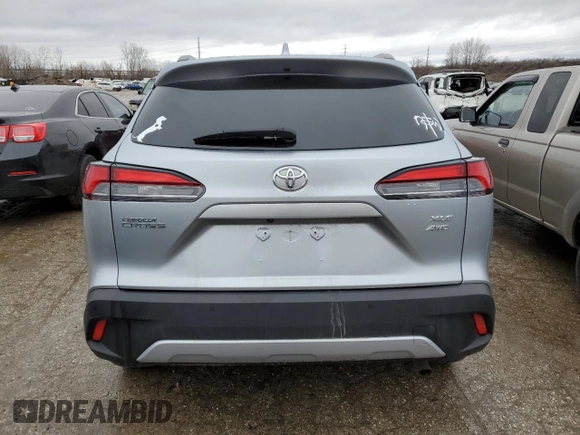 2022 Toyota Corolla Cross XLE with VIN 7MUDAABG1NV040838, listed as a Copart auction lot 43381005 with Not provided miles and Salvage title. Bid and sale history available at DreamBid. Image 6.