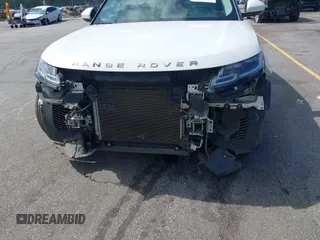 2018 Land Rover Range Rover Velar S z VIN SALYB2RV2JA746977, wystawiony jako IAAI lot #42423513 z przebiegiem 148 062 mil mil oraz . Historia ofert i sprzedaży dostępna na DreamBid. Obrazek 6.