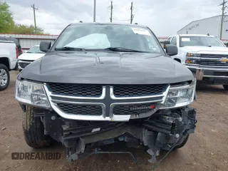 2020 Dodge Journey SE Value z VIN 3C4PDCAB2LT202088, wystawiony jako IAAI lot #41894515 z przebiegiem 97 564 mil mil oraz . Historia ofert i sprzedaży dostępna na DreamBid. Obrazek 12.