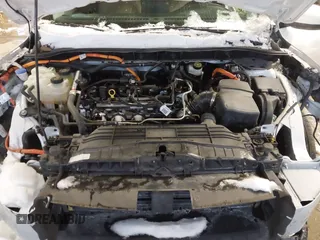 2021 Ford Escape SE Hybrid with VIN 1FMCU9BZ3MUA17452, listed as a IAAI auction lot 41626415 with 62,326 mi miles and . Bid and sale history available at DreamBid. Image 10.