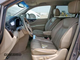 2014 Nissan Quest SV z VIN JN8AE2KP0E9101509, wystawiony jako Copart lot #58003325 z przebiegiem 198 287 mil mil oraz Tytuł czysty. Historia ofert i sprzedaży dostępna na DreamBid. Obrazek 7.