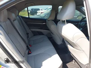 2018 Toyota Camry LE z VIN 4T1B11HK8JU155953, wystawiony jako IAAI lot #40609365 z przebiegiem 53 296 mil mil oraz . Historia ofert i sprzedaży dostępna na DreamBid. Obrazek 8.