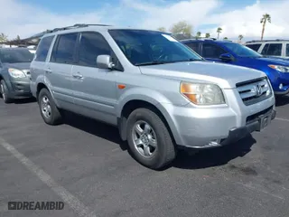 2007 Honda Pilot EX-L with VIN 5FNYF28677B005956, listed as a IAAI auction lot 41948401 with 185,599 mi miles. Bid and sale history available at carsss.com. Image 1.