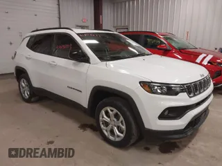 2024 Jeep Compass Latitude with VIN 3C4NJDBN0RT117984, listed as a IAAI auction lot 41903631 with 24,067 mi miles. Bid and sale history available at carsss.com. Image 1.