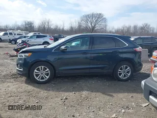 2019 Ford Edge SEL z VIN 2FMPK4J9XKBC58603, wystawiony jako IAAI lot #41814067 z przebiegiem 135 198 mil mil oraz . Historia ofert i sprzedaży dostępna na DreamBid. Obrazek 14.