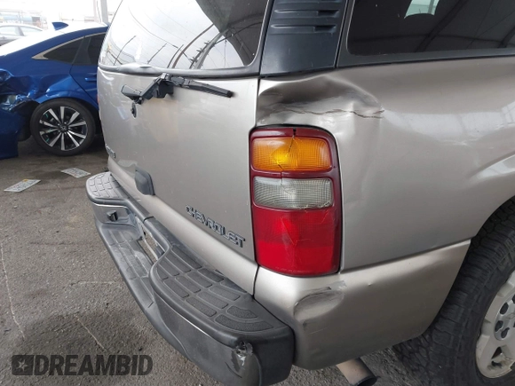 2002 Chevrolet Tahoe LS with VIN 1GNEC13T62R311933, listed as a IAAI auction lot 41895509 with 236,603 mi miles and . Bid and sale history available at DreamBid. Image 6.