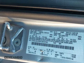 2015 Ford Escape Titanium with VIN 1FMCU0JX2FUB70760, listed as a IAAI auction lot 41649089 with 1 mi miles. Bid and sale history available at carsss.com. Image 9.