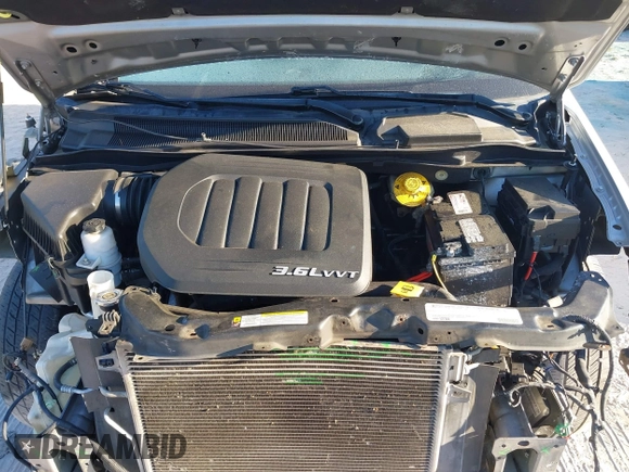 2018 Dodge Grand Caravan SXT with VIN 2C4RDGCG5JR267428, listed as a IAAI auction lot 41877661 with 103,633 mi miles and . Bid and sale history available at DreamBid. Image 10.