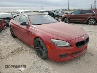 2013 BMW 6 Series 650i with VIN WBA6B2C50DDG66703, listed as a Copart auction lot 82225824 with 199,076 mi miles and Salvage Title. Bid and sale history available at DreamBid. Image 4.