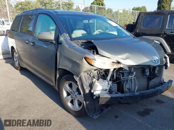2013 Toyota Sienna LE AAS with VIN 5TDKK3DC0DS313786, listed as a IAAI auction lot 41981268 with 162,423 mi miles. Bid and sale history available at carsss.com. Image 1.