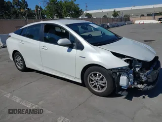2016 Toyota Prius Two z VIN JTDKBRFU6G3021221, wystawiony jako IAAI lot #42239673 z przebiegiem 182 554 mil mil oraz . Historia ofert i sprzedaży dostępna na DreamBid. Obrazek 1.