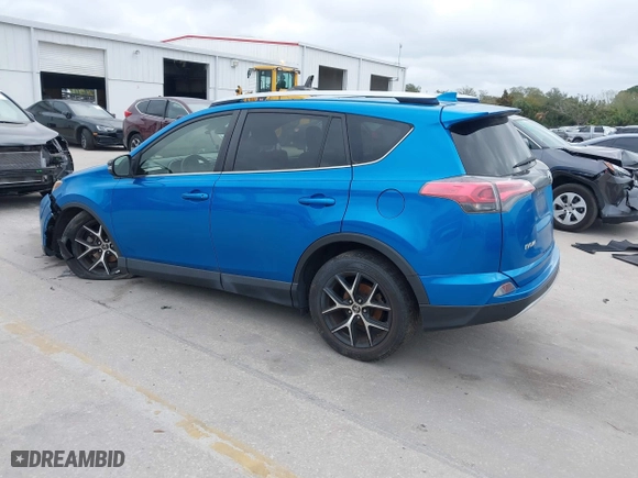 2016 Toyota RAV4 SE with VIN JTMJFREV3GJ076876, listed as a IAAI auction lot 41566899 with 133,216 mi miles. Bid and sale history available at carsss.com. Image 3.