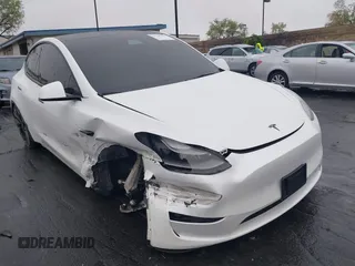 2022 Tesla Model Y Performance z VIN 7SAYGDEF4NF411416, wystawiony jako IAAI lot #42189351 z przebiegiem 39 151 mil mil oraz . Historia ofert i sprzedaży dostępna na DreamBid. Obrazek 1.
