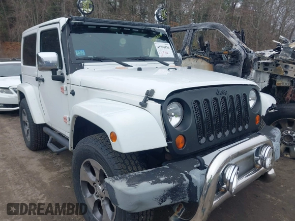2011 Jeep Wrangler Sahara with VIN 1J4AA5D15BL538240, listed as a IAAI auction lot 41793836 with 172,528 mi miles and . Bid and sale history available at carsss.com. Image 1.