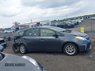 2012 Toyota Prius Two z VIN JTDZN3EU7C3053321, wystawiony jako IAAI lot #42386200 z przebiegiem 94 041 mil mil oraz . Historia ofert i sprzedaży dostępna na DreamBid. Obrazek 13.