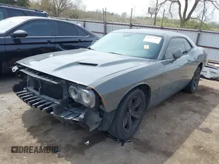 2018 Dodge Challenger SXT z VIN 2C3CDZAG9JH229506, wystawiony jako IAAI lot #41915902 z przebiegiem 145 486 mil mil oraz . Historia ofert i sprzedaży dostępna na DreamBid. Obrazek 2.