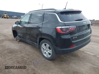 2022 Jeep Compass Latitude with VIN 3C4NJDBB6NT117925, listed as a IAAI auction lot 41779788 with 58,480 mi miles and . Bid and sale history available at DreamBid. Image 3.