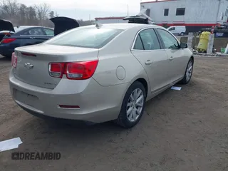 2014 Chevrolet Malibu LT with VIN 1G11E5SLXEF255357, listed as a IAAI auction lot 41363252 with 259,751 mi miles and . Bid and sale history available at DreamBid. Image 4.