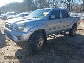 2014 Toyota Tacoma with VIN 3TMLU4ENXEM147587, listed as a IAAI auction lot 41493027 with 160,207 mi miles. Bid and sale history available at carsss.com. Image 18.
