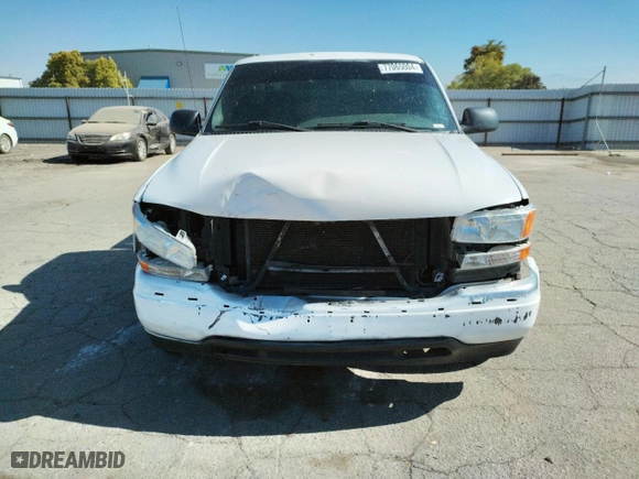 2002 GMC Sierra 1500 with VIN 1GTEC14X92Z329482, listed as a Copart auction lot 77065004 with 150,377 mi miles and Salvage Title. Bid and sale history available at carsss.com. Image 5.