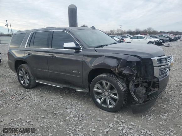 2015 Chevrolet Tahoe LTZ with VIN 1GNSCCKC3FR609104, listed as a Copart auction lot 42338025 with 193,676 mi miles and Salvage Title. Bid and sale history available at carsss.com. Image 4.