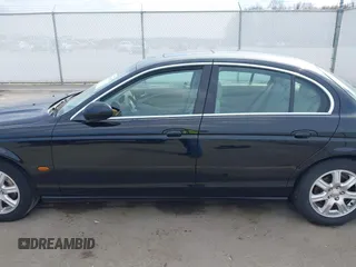2003 Jaguar S-Type with VIN SAJEA01T93FM64497, listed as a IAAI auction lot 41804705 with 224,978 mi miles and . Bid and sale history available at DreamBid. Image 14.