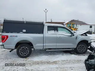 2021 Ford F-150 XL with VIN 1FTFX1E54MFC43510, listed as a IAAI auction lot 41251459 with 15,391 mi miles and . Bid and sale history available at DreamBid. Image 13.