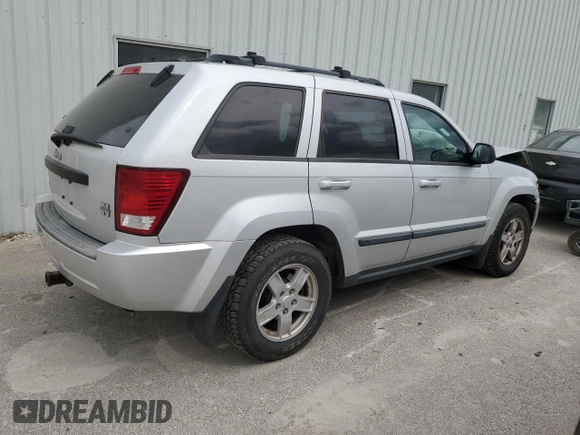 2007 Jeep Grand Cherokee Laredo z VIN 1J8GR48K37C617623, wystawiony jako Copart lot #55875115 z przebiegiem 117 588 mil mil oraz Szkoda całkowita • Salvage title. Historia ofert i sprzedaży dostępna na DreamBid. Obrazek 3.
