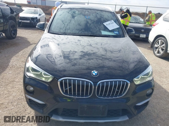 2016 BMW X1 xDrive28i with VIN WBXHT3Z3XG4A48557, listed as a IAAI auction lot 41387960 with 84,821 mi miles. Bid and sale history available at carsss.com. Image 6.