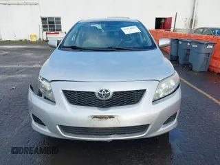 2009 Toyota Corolla with VIN 1NXBU40E39Z131392, listed as a IAAI auction lot 41194018 with 136,031 mi miles. Bid and sale history available at carsss.com. Image 12.