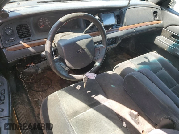 2006 Ford Crown Victoria z VIN 2FAFP73V76X148099, wystawiony jako Copart lot #49996435 z przebiegiem Nie podano mil oraz Szkoda całkowita • Salvage title. Historia ofert i sprzedaży dostępna na DreamBid. Obrazek 8.