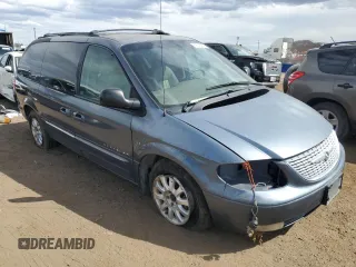 2001 Chrysler Town & Country LXi with VIN 2C4GP54L11R176042, listed as a Copart auction lot 69045254 with 217,421 mi miles and Salvage Title. Bid and sale history available at DreamBid. Image 4.