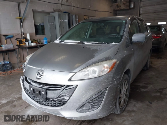 2012 Mazda 5 Sport with VIN JM1CW2BL6C0136149, listed as a IAAI auction lot 41394654 with 149,257 mi miles. Bid and sale history available at carsss.com. Image 2.